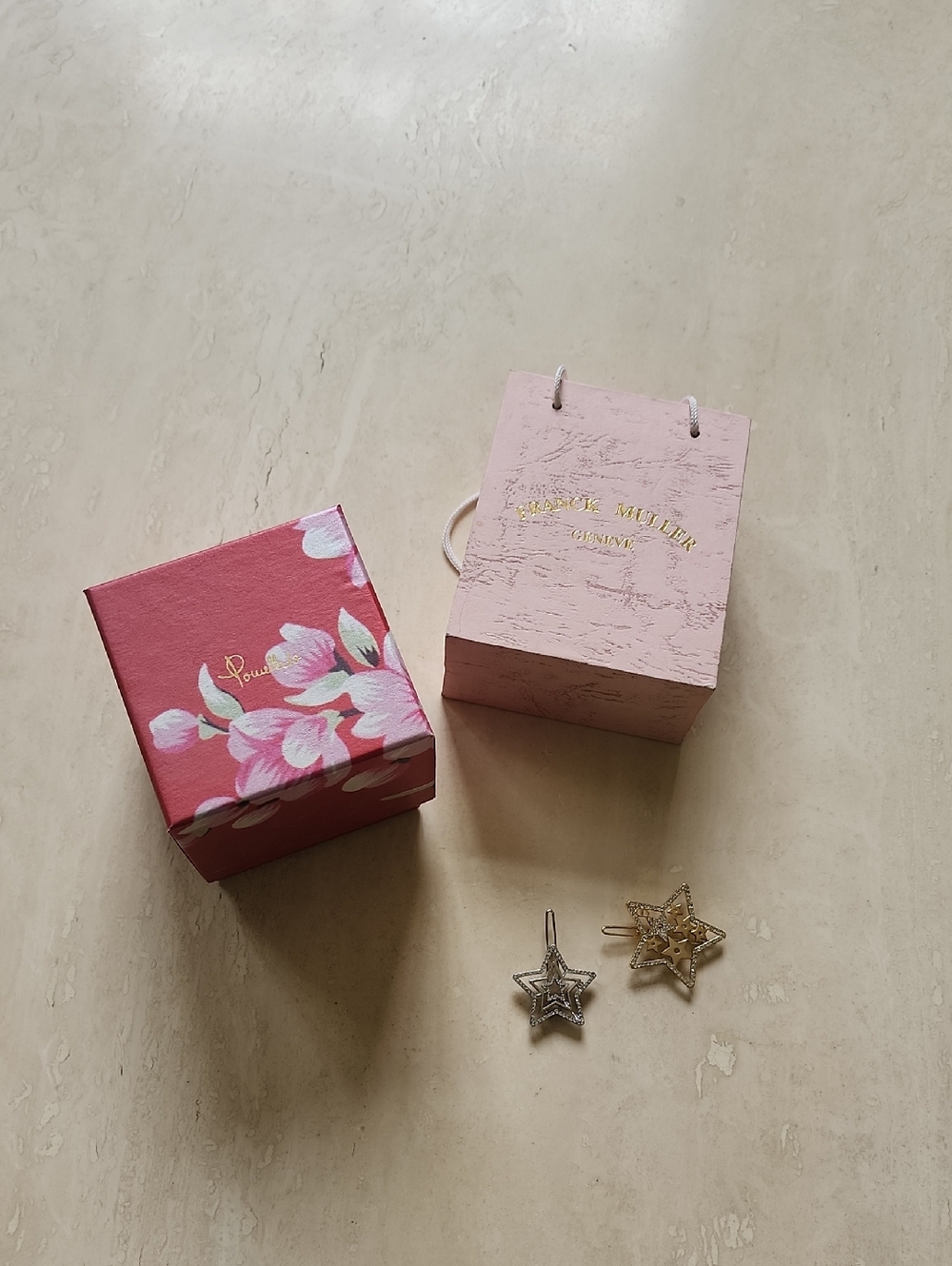 Dior Hair Clips And A Pomellato Ring Box And A Franck Muller Box